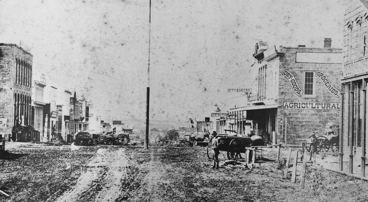 What this town needs most is a public library, said a group of Beatrice residents a year before this 1874 photograph. The view is west along Court Street from Fourth Street.  NSHS RG4396-13-68