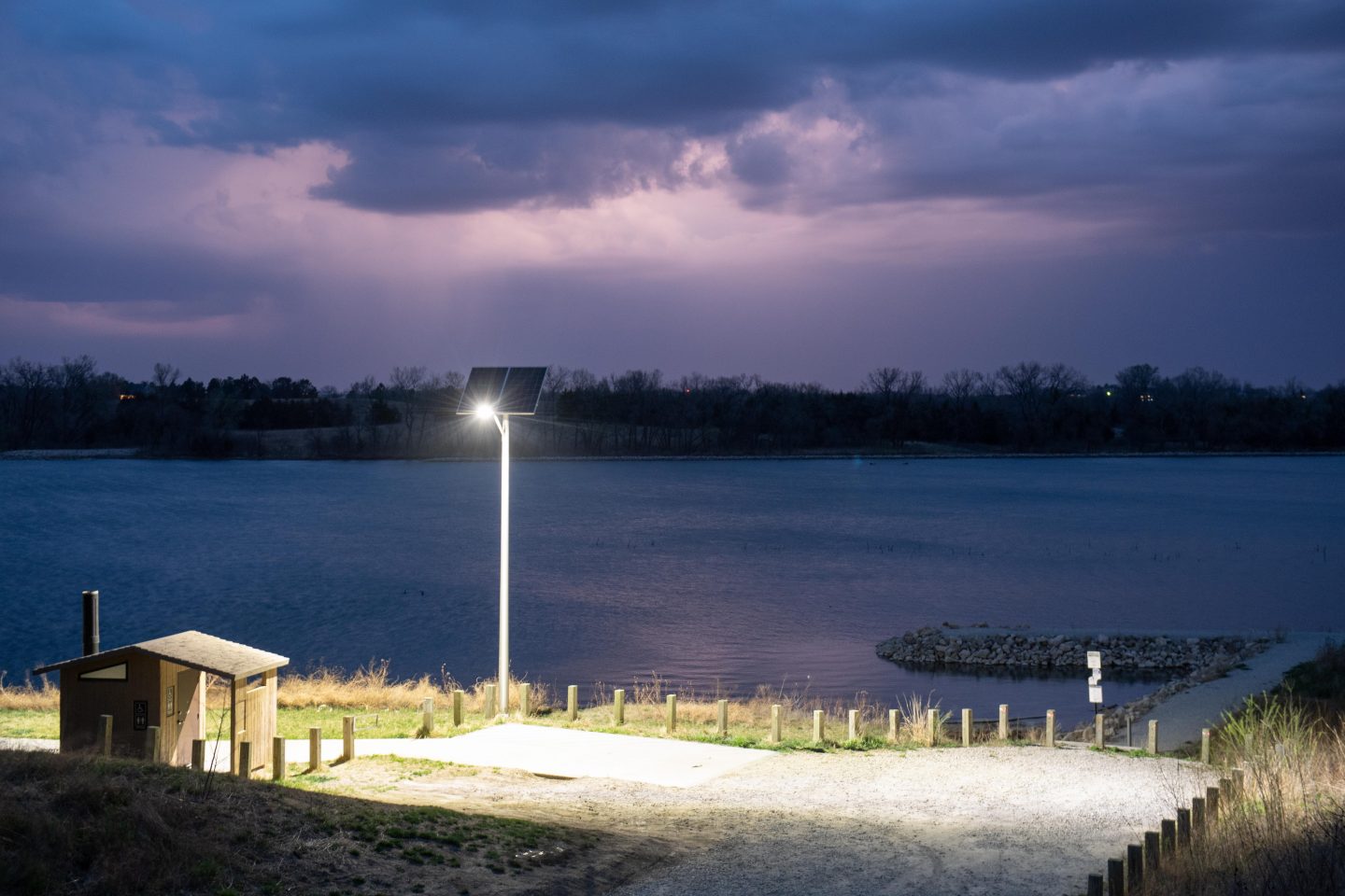 A solar-powered light illuminates a parking lot on the south side of Conestoga State Recreation Area.