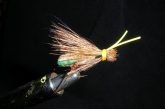 Hand-tied foam hopper fly on the vice.