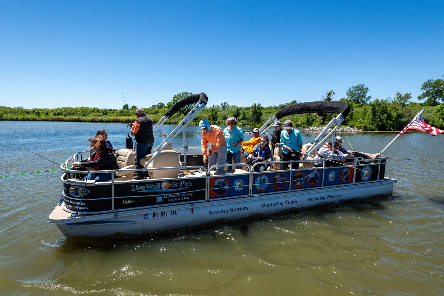 The 26-foot Live Well. Go Fish. pontoon boat can hold 14 people, but never carries more than 13 on its outings. It has room for three wheelchairs, and once hosted a hospice patient in a hospital bed.