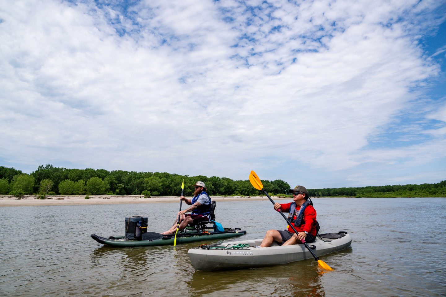 Two men kayaking on the Loup River Water Trail.