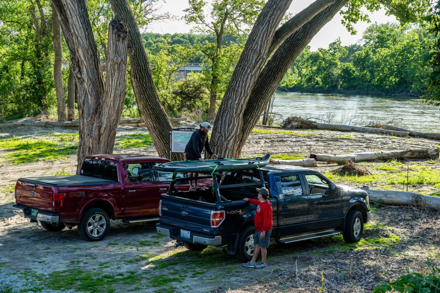 Brian and Ken Curry load up their gear at a new access point on the Loup River Water Trail south of Monroe.
