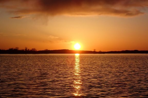 Sunset reflecting off lake.