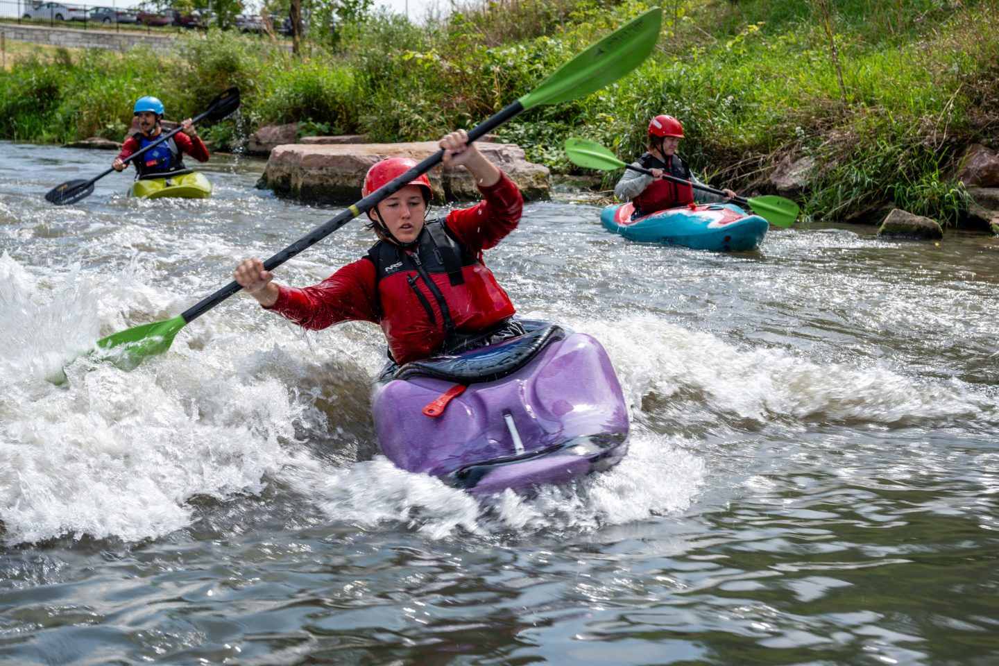 Lily Bloomfield of Minden paddles a whitewater kayak on one of the rapids with other participants during a University of Nebraska – Lincoln Outdoor Adventures trip.
