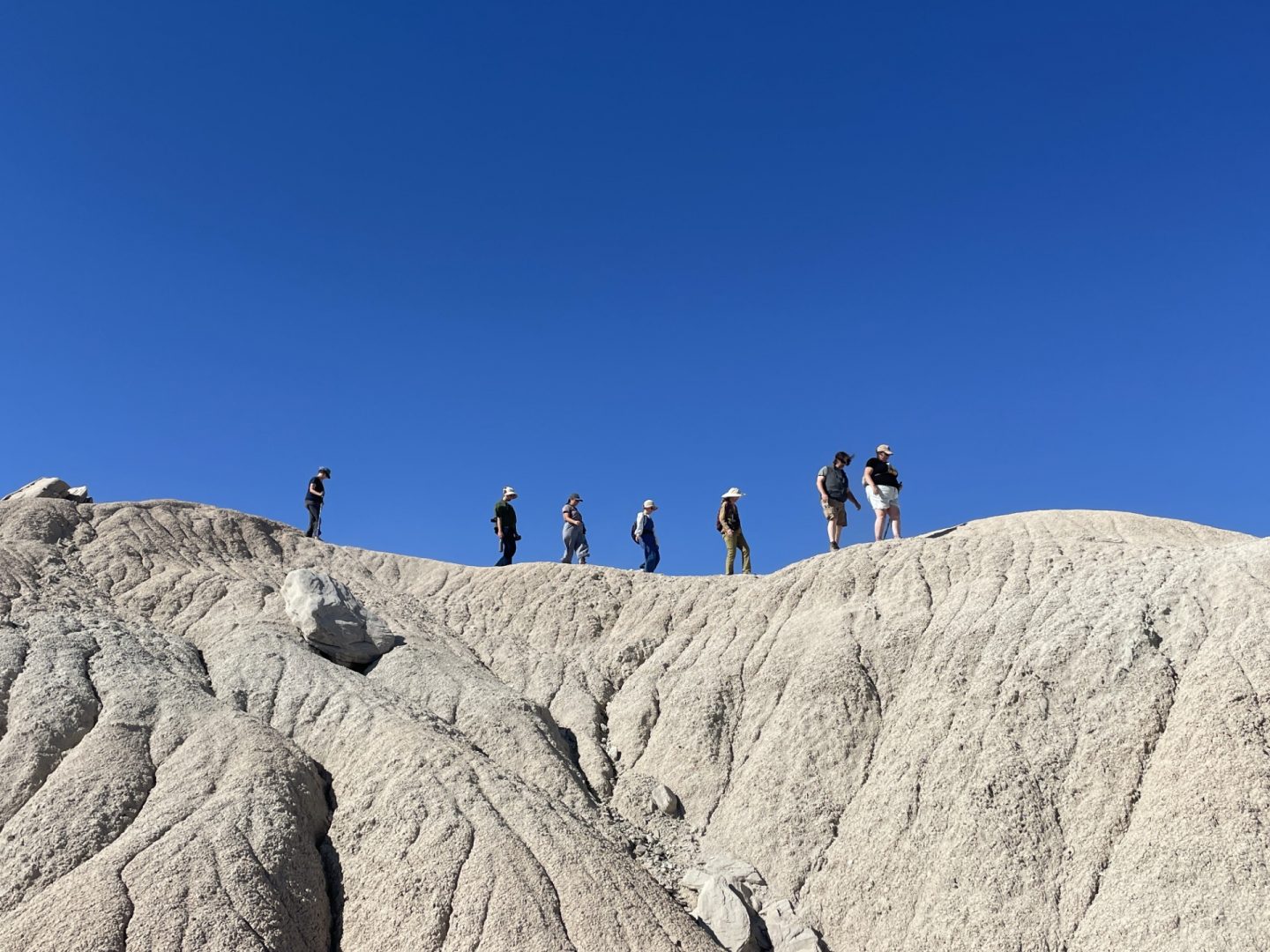 People on a landform at Toadstool Geological Park.