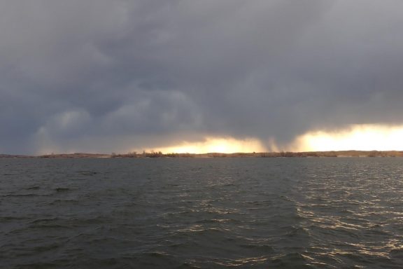 Thunderstorm over a Nebraska lake.