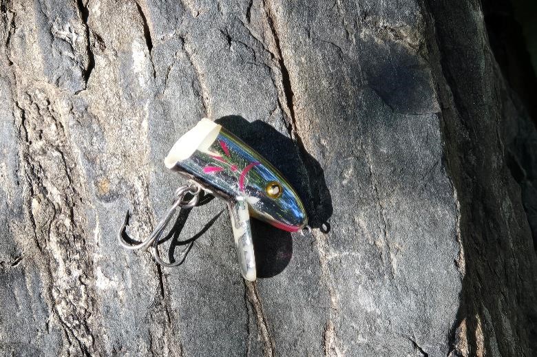 Head of a broken lure on a rock. Photo by Daryl Bauer, Nebraska Game & Parks Commission.