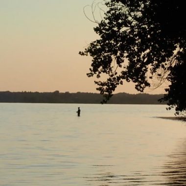Wading angler. Photo by Daryl Bauer, Nebraska Game & Parks Commission.