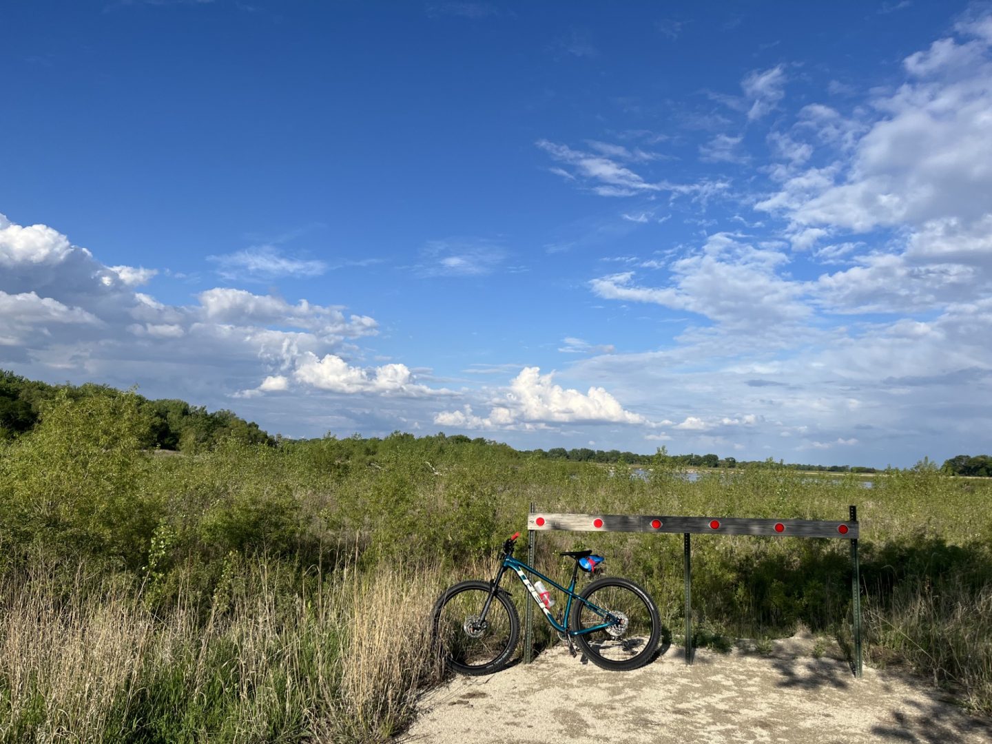 Author’s bike leaning on the blockage where a bridge is out on the Cowboy Trail east of Clearwater.