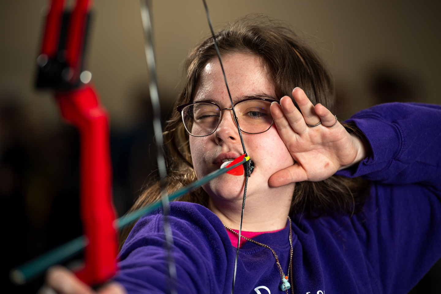 Wanting to continue shooting in NASP after a hand injury left Natalie Nutzman of Milford unable to pull back a bow, she adapted by learning to shoot with a mouth tab.