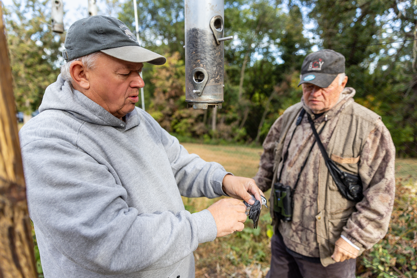 Brothers Mark, left, and Ed Brogie have been running the bird banding station since the expo’s first year.