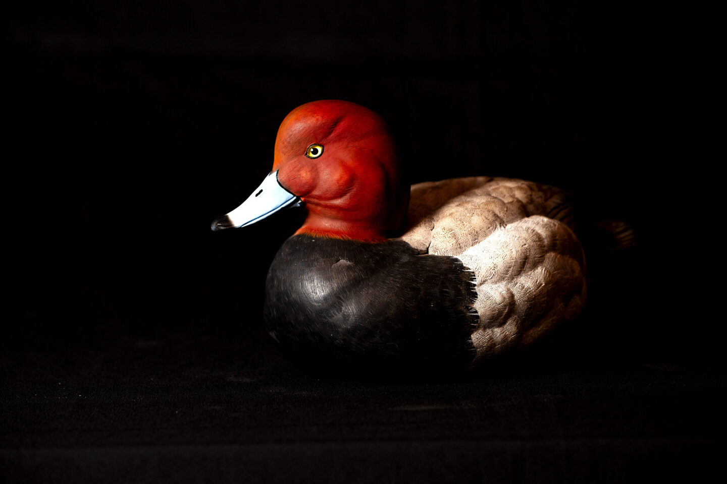 “I’m not going back,” Dick Zechmann — artist of this redhead — told his wife after his first club meeting. “They were so good.” But without their encouragement through the years, Dick would not have become the carver he is.
