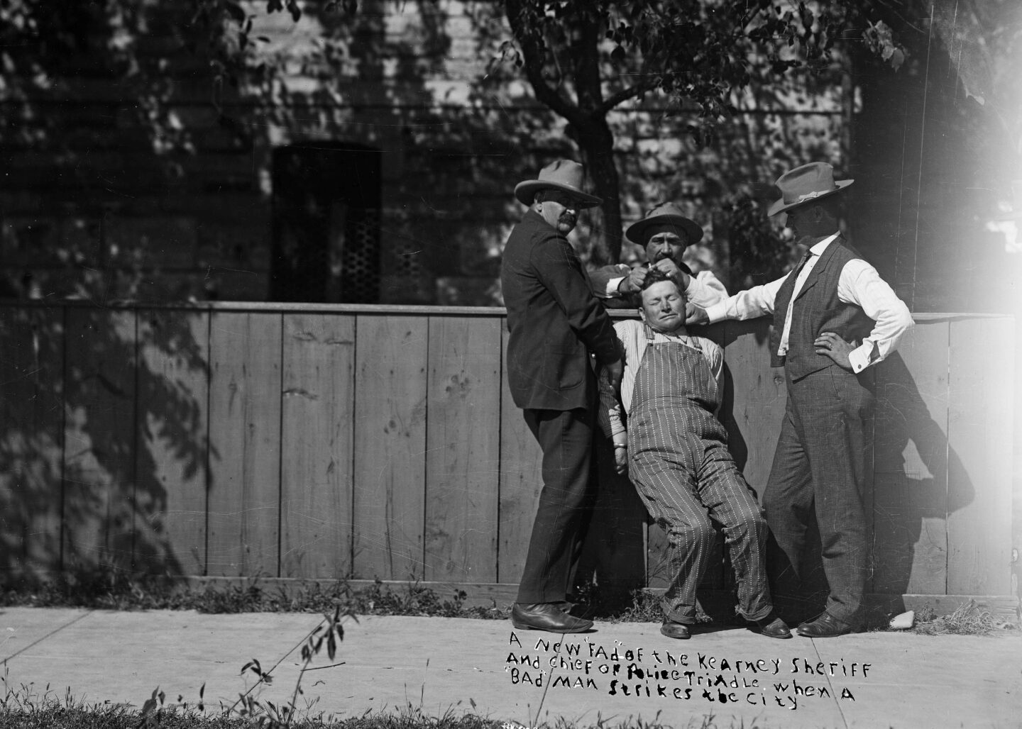 “A new fad of the Kearney sheriff and Chief of Police Trindle when a bad man strikes the city.” Photo by Solomon D. Butcher, 1905.