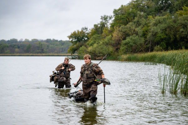 Kobie Hill and Caleb Bruhn of Lincoln head back to their vehicles following a morning duck hunt.