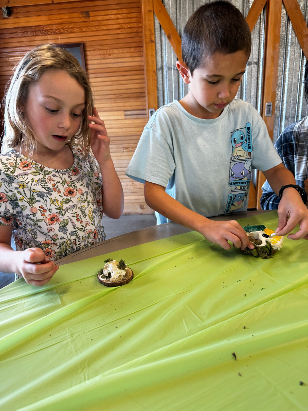 Kids crafting with bones.
