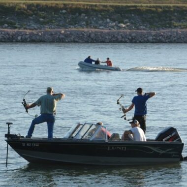 Paddlefish bowfishers below Gavins Point Dam.