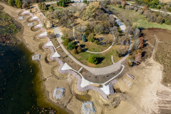 Nine fishing points and an accessible fishing pier and sidewalk built on the north side of Standing Bear Lake in Omaha improved angler access. Rock shoals and other structures, now concealed by water, will improve fish habitat.