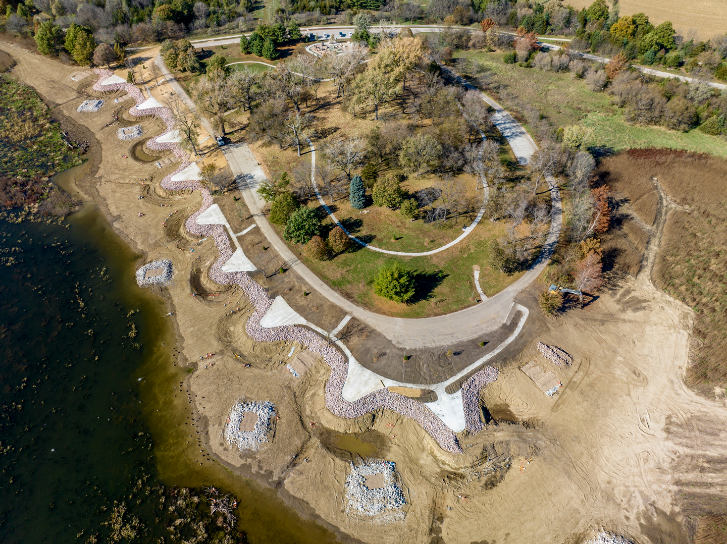 Nine fishing points and an accessible fishing pier and sidewalk built on the north side of Standing Bear Lake in Omaha improved angler access. Rock shoals and other structures, now concealed by water, will improve fish habitat.