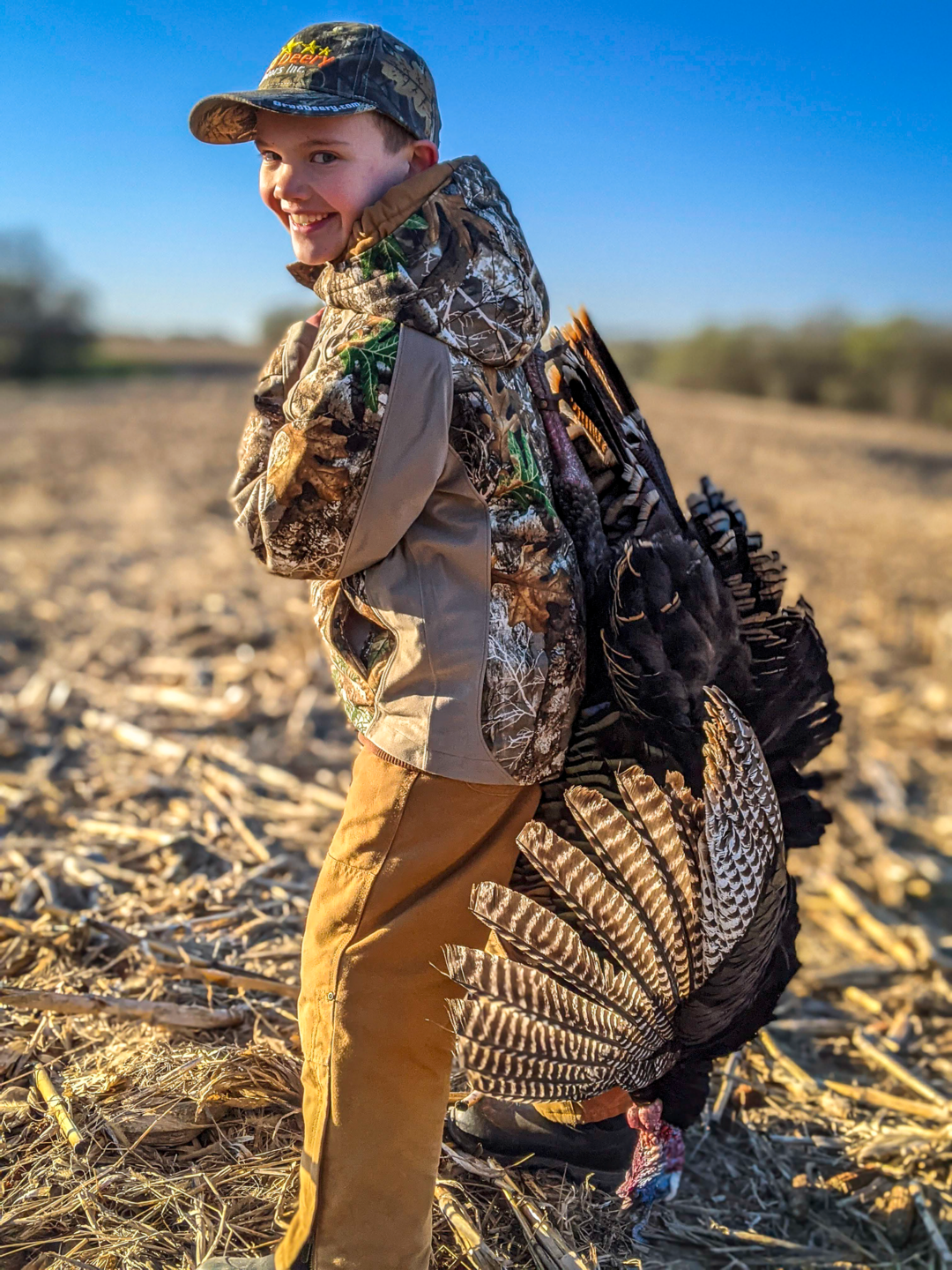 Ryan Sparks’ nephew, Abe Lovewell, was all smiles after his first turkey in 2021.