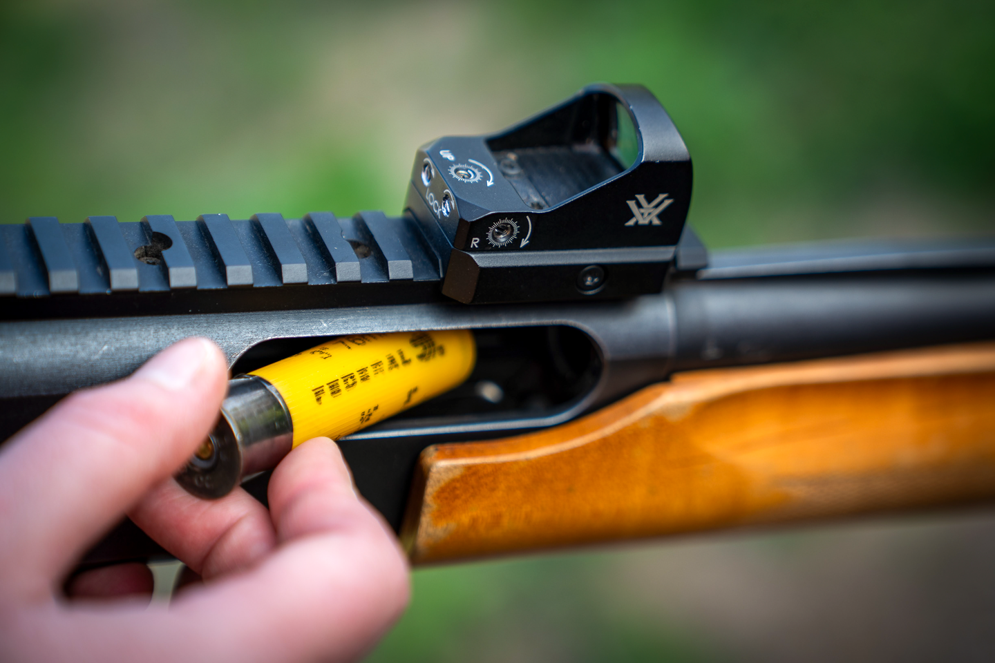 A red dot sight can help turn chaos into clarity. A single glowing dot gives you a precise point of aim.