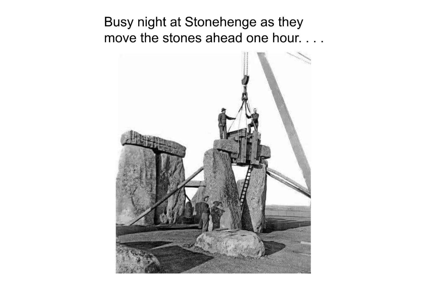 Workers moving stones as Stonehenge. Internet meme.