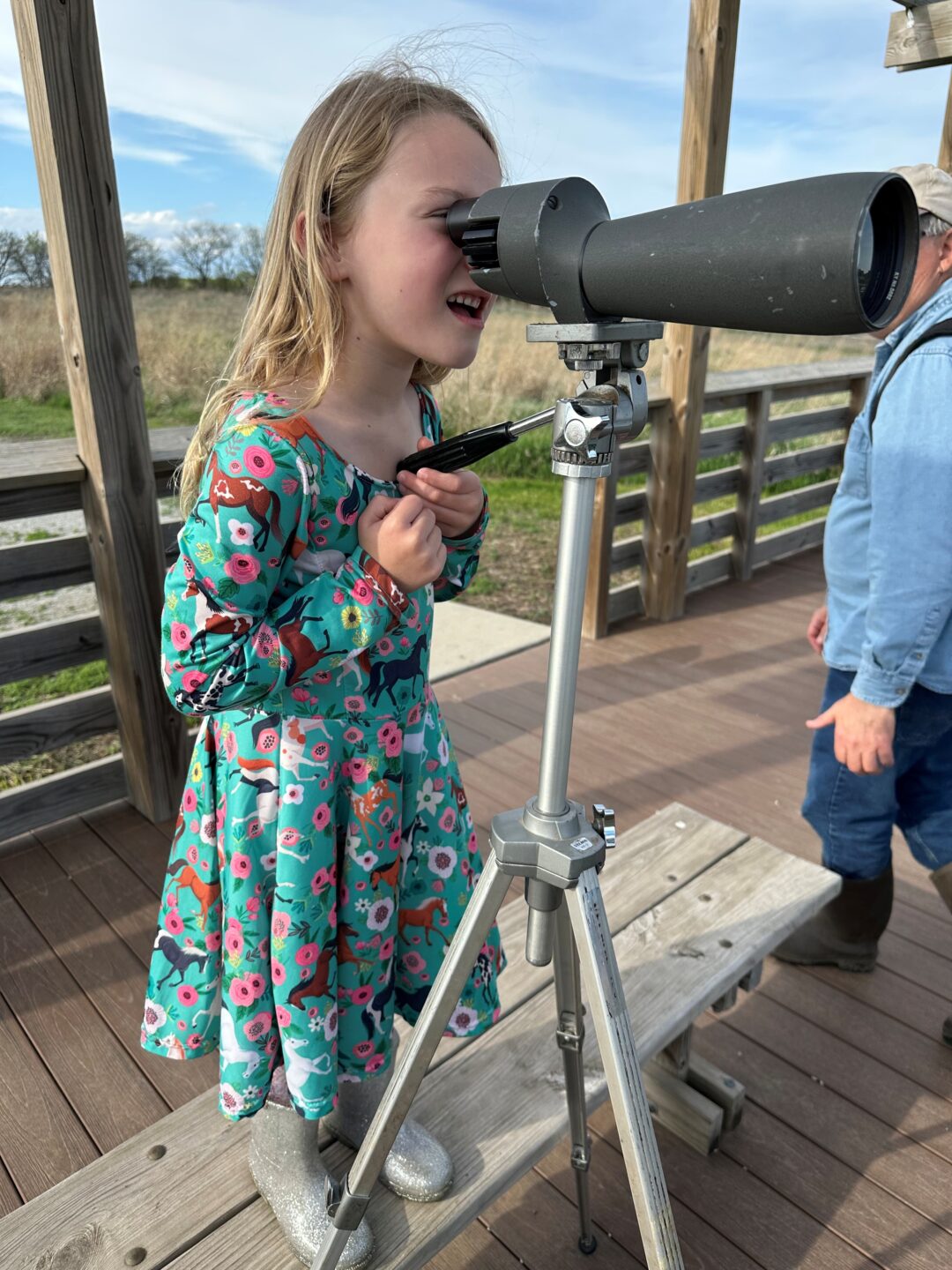 The author's daughter, Tori, birdwatching.