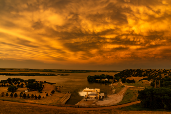The sky glows over the Kingsley Hydroplant on Lake Ogallala.