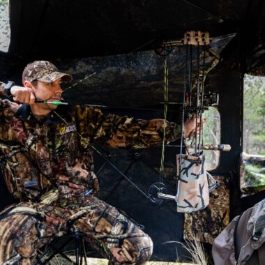 Jacob Chandler of Omaha hunts from a blind using a bow at Chadron State Park in Dawes County.