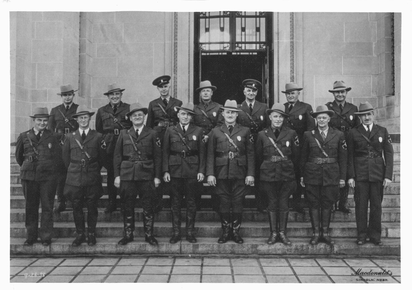 1938 group photo of Nebraska conservation officers in new uniform.