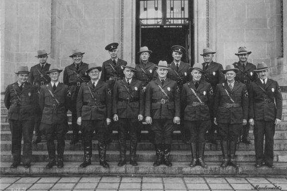 1938 group photo of Nebraska conservation officers in new uniform.