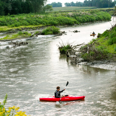 Kayakers float Logan Creek, also known as “the dredge,” in Thurston County.