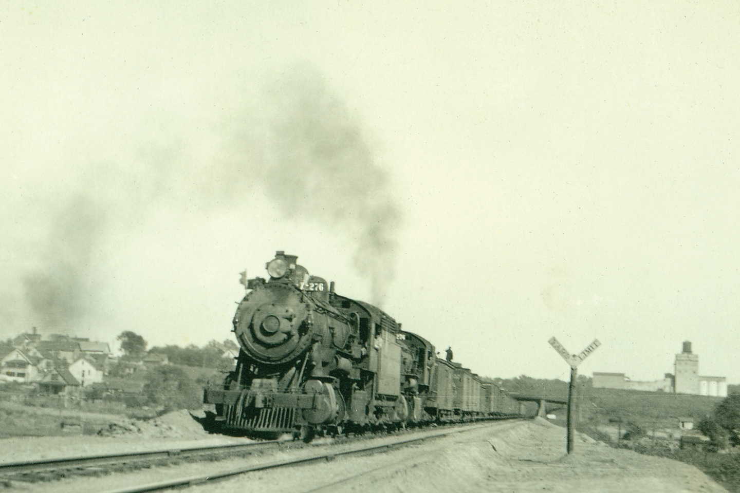 A double-header freight train leaving the Union Pacific yard near South 35th Street in Omaha, 1921. This is about seven blocks east of where the Overland Limited train was robbed in 1909. NSHS RG2941-6-70