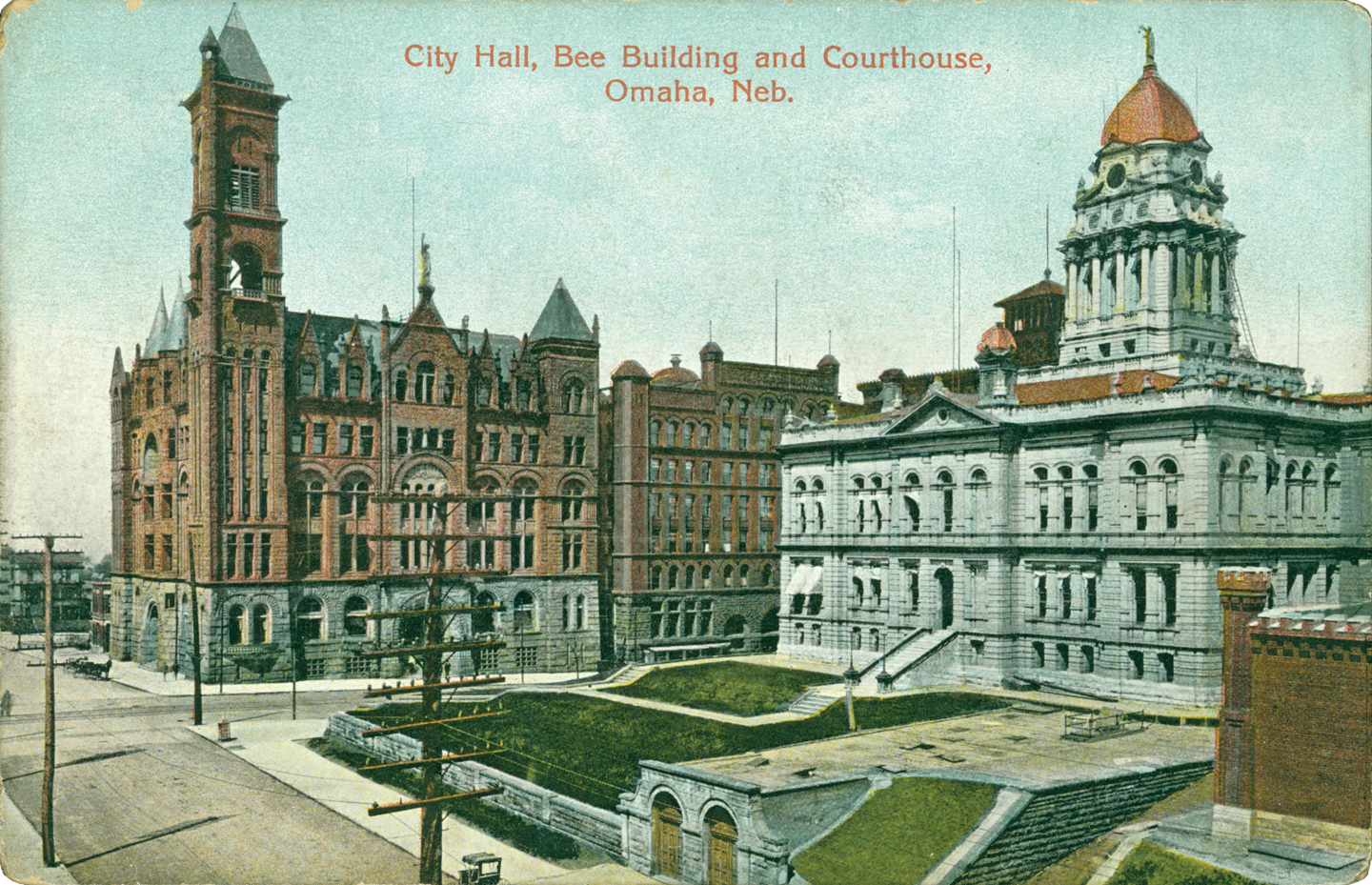 The old Douglas County Courthouse, right, on the site of the present courthouse. A corner of the turreted, red-brick county jail is shown at far right. NSHS RG3348-6-394.