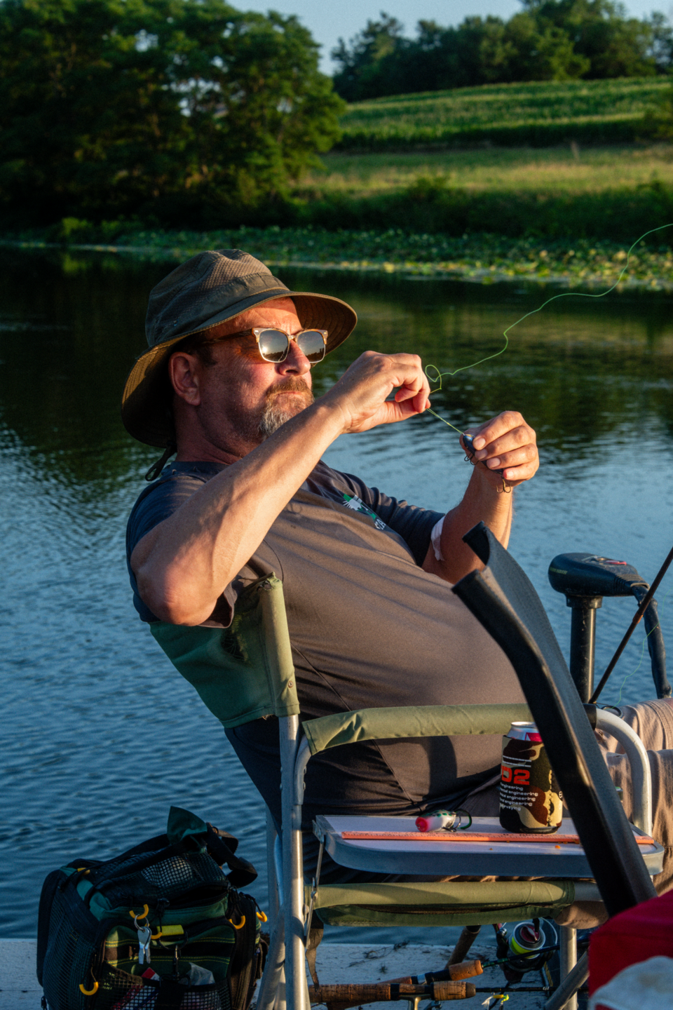 A man baiting a hook.
