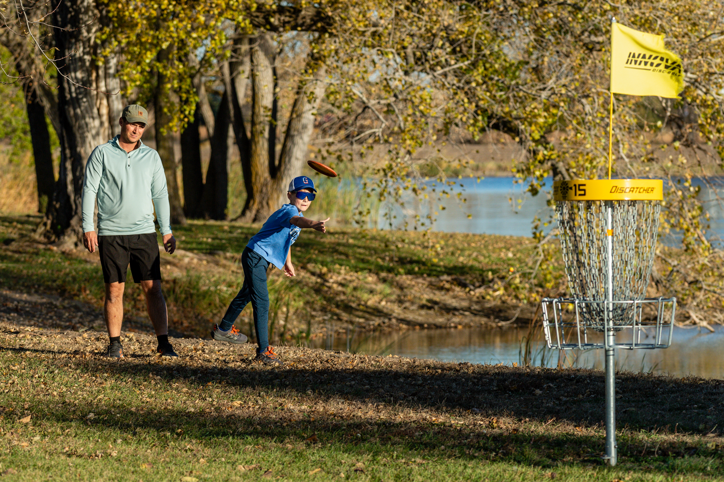 Eli Gartner makes a throw near a pond at 
Windmill State Recreation Area.