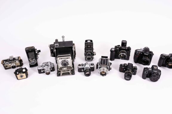 The evolution of cameras similar to ones that have been used by Nebraskaland photographers during the past 100 years ranges from box, folding, press, rangefinder, twin-lens reflex and Hasselblad, medium format, 35mm single-lens reflex, and digital SLR and mirrorless.