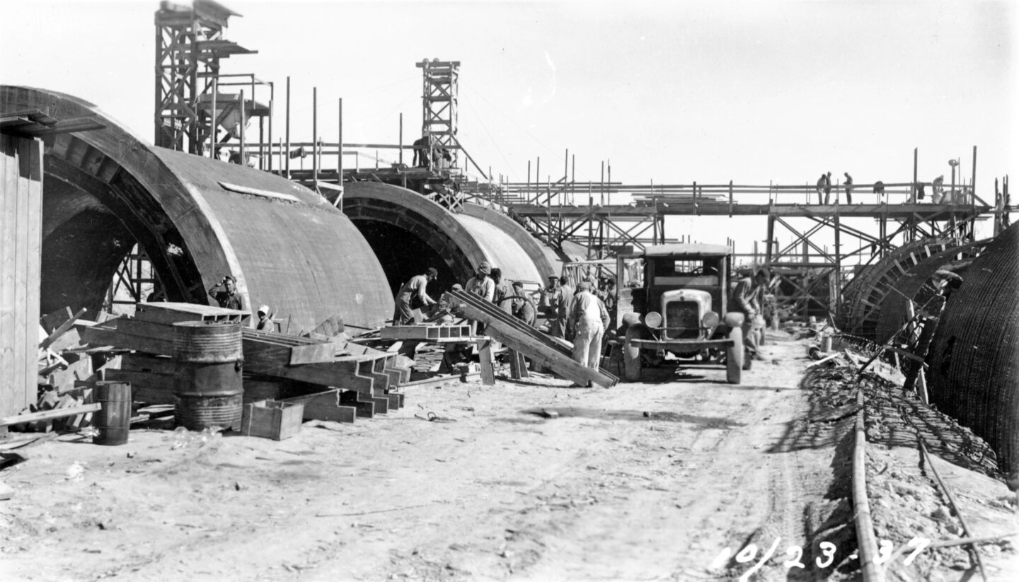 Workers prepare for the dam to move massive amounts of water. NSHS 2114-4-117