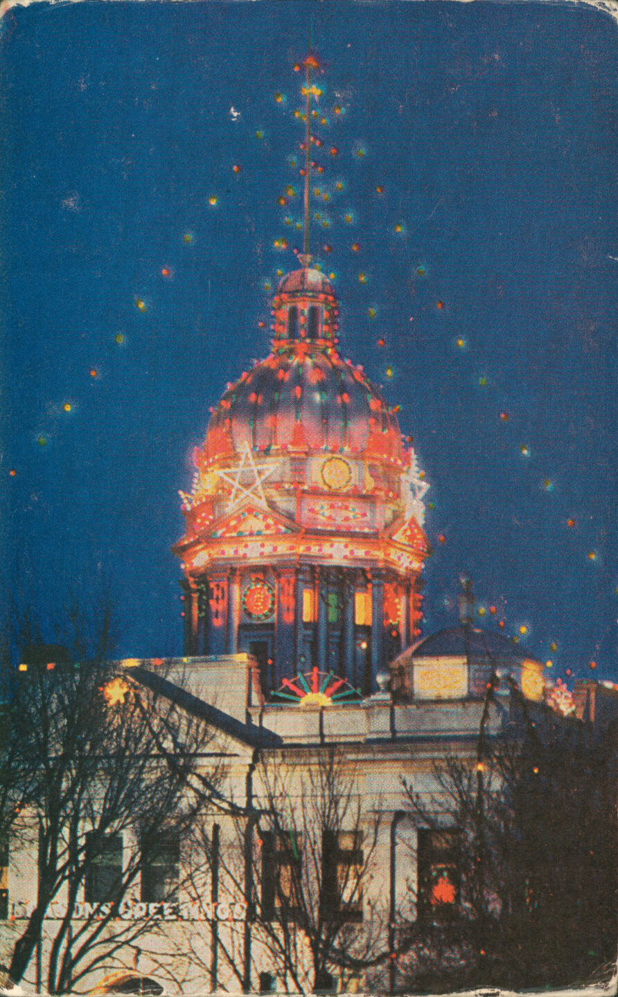 Kearney County Courthouse in Minden, decked out for the holidays, undated postcard. NSHSRG2100-3-9