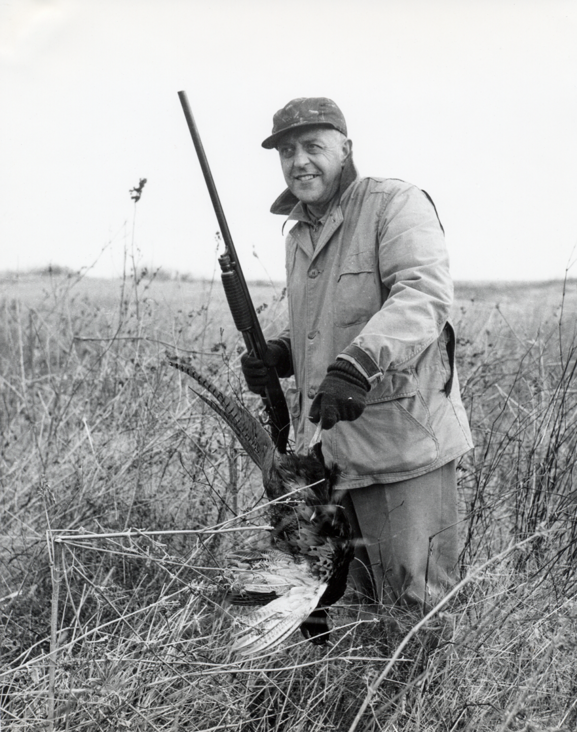 Nebraskaland artist “Bud” Pritchard hunts pheasants in the early 1960s. Nebraskaland Photo Library