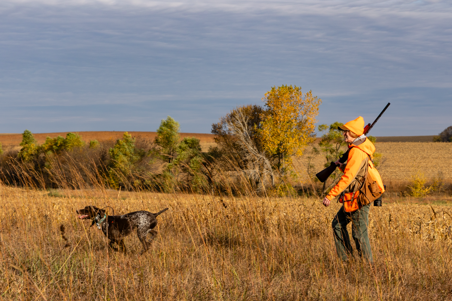 Marissa Jensen of Omaha hunts with her German shorthaired pointer on Open Fields and Waters land near Crab Orchard. Jenny Nguyen-Wheatley