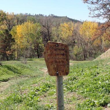 Sign to Soldier Creek Wilderness Area. Has an artistic, fired look to it now. Photo by Daryl Bauer, Nebraska Game & Parks Commission.